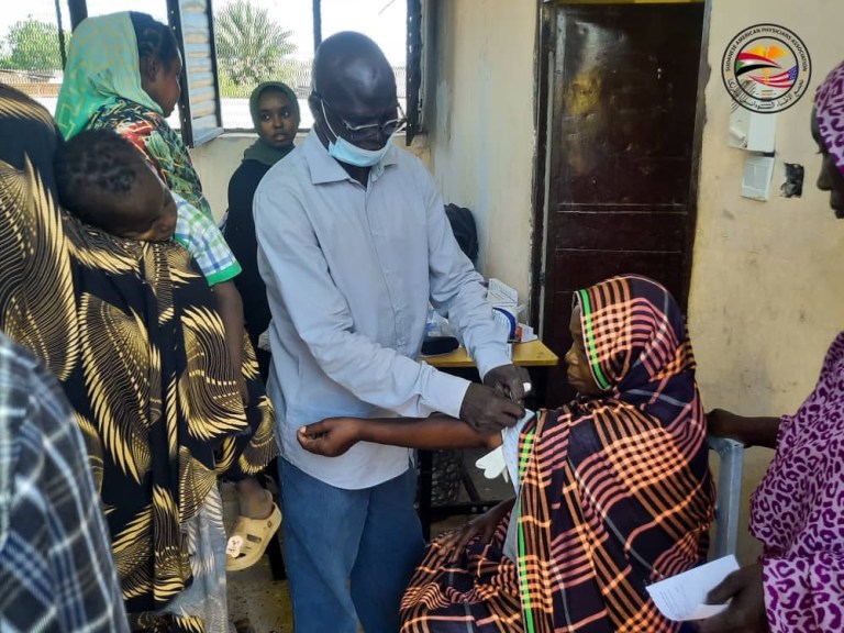 Doctor consulting the patients in Sudan