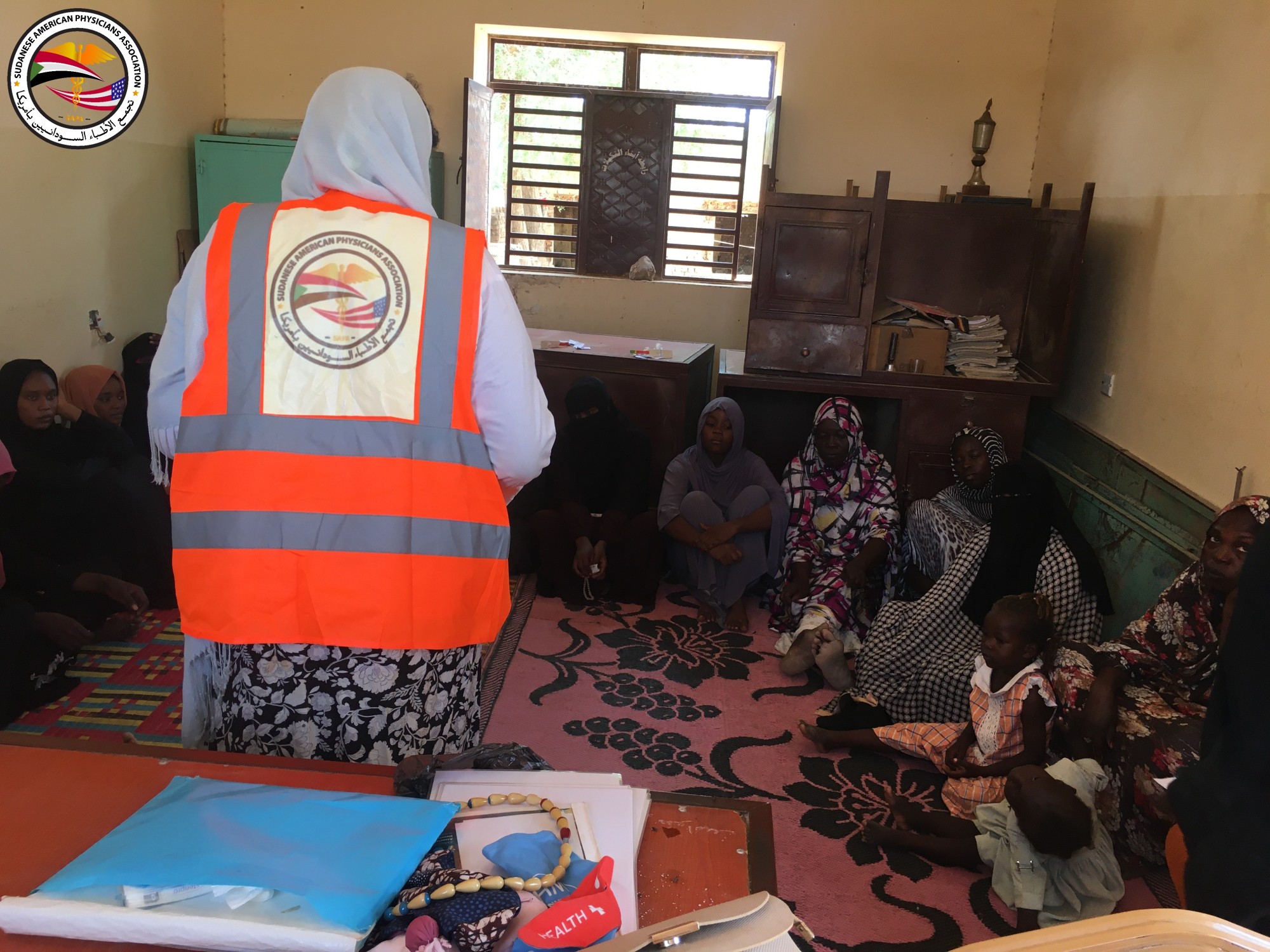 Sudanese doctor helping the patients